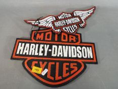 Two cast iron wall plaques adverting Harley-Davidson (ymch2)