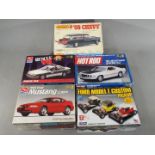 AMT, Matchbox, Revell, Lindberg - Five boxed model kits in various scales.