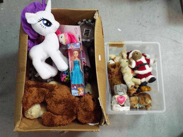 A large quantity of childrens soft toys, dolls and toys.