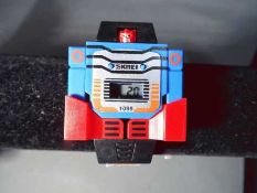 Transformers - a childs Transformer digital watch, model number 1095,