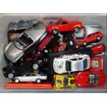 Maisto, Bburago, and Others - A quantity of unboxed diecast model vehicles predominately 1:24 scale.