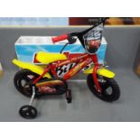 Dino - A boxed Dino Lightning McQueen 12" Childrens Bicycle.