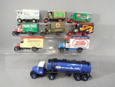 Corgi - Nine unboxed vehicles by Corgi to include Ever Ready Batteries Tanker, Army Ambulance,