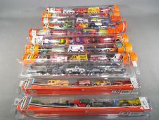 Matchbox Mattel Wheels - eight sealed tubes containing five model motor vehicles and three Matchbox