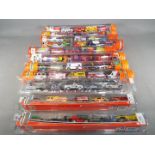 Matchbox Mattel Wheels - eight sealed tubes containing five model motor vehicles and three Matchbox