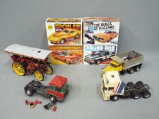 MPC, and Others - Four boxed 1:25 scale model kits by MPC and a quantity of built models.