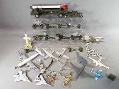 A collection of diecast model aeroplanes and military vehicles by Corgi, Dinky and similar,