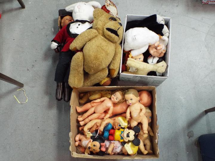 A large collection of vintage dolls and childrens soft toys all in Playworn condition.