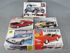 AMT, MPC, Revell, Lindberg, Monogram - Five boxed model kits in various scales.