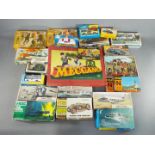 A mixed lot comprising approximately 15 boxed kit models, scenics, military, etc.