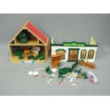 Sylvanian Families, Tomy - A collection of unboxed Sylvanian Family figures and accessories.
