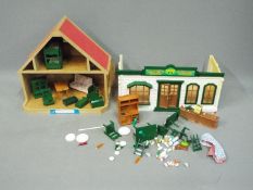 Sylvanian Families, Tomy - A collection of unboxed Sylvanian Family figures and accessories.