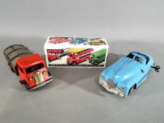Minic Toys - two clockwork Minic Toy cars, one with key,