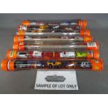 Matchbox Mattel Wheels - seven sealed tubes containing five model motor vehicles,