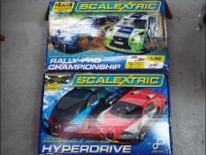 Scalextric - Two boxed Scalextric sets including Rally Pro Championship an Bugatti Veyron