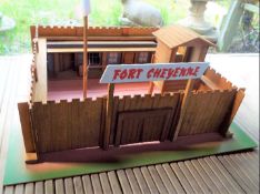 A model Fort Cheyenne and a box containing a large quantity of plastic soldiers,