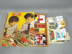 A Vintage Lego system set presented in a wooden box together with a small amount of boxed diecast