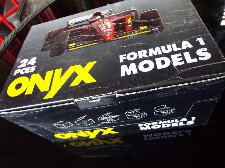 Onyx - 24 diecast model F1 racing cars with driver figures in square rigid transparent cases, - Image 2 of 2