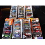 Matchbox on a Mission, Mattel seven sealed packs each containing five model motor vehicles,
