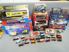 Various diecast model motor vehicles in a mixture of scales, predominantly boxed,