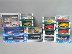 A collection of boxed diecast model vehicles in various scales to include Cararama and Oxford