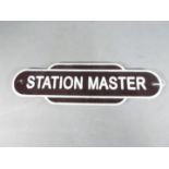 A cast iron station master sign,