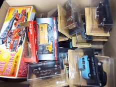 A good mixed lot of approximately 25 boxed model motor vehicles to include Corgi, Solido,