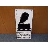 A large cast iron level crossing railway sign,