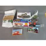 Tamiya, Airfix; Sun Ta Toys, Corgi - An assortment of 11 diecast and plastic model vehicles,