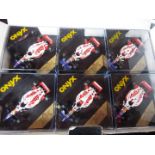 Onyx - 24 diecast model F1 racing cars with driver figures in square rigid transparent cases,