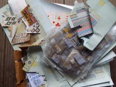 A box containing a very large quantity of decals / transfers, predominantly military,