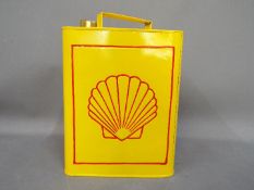 An advertising can, displaying Shell fuel, approximate height 34 cm [VCSSQ].