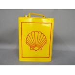 An advertising can, displaying Shell fuel, approximate height 34 cm [VCSSQ].