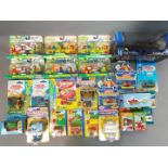 Various children's diecast and other toys to include Sesame Street,