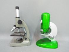 Two unboxed microscopes to include a Griffin Gamma 20 and a Quick-Switch.