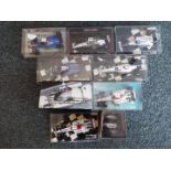 Minichamps - A collection of 8 F1 diecast model racing cars in 1:43 scale plus a 1:8 scale Keke