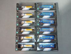 Hongwell, Cararama - Twelve 1/80 scale diecast model trucks by Hongwell / Cararama.