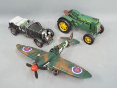 Three unboxed large scale decorative models depicting a Bentley Blower;