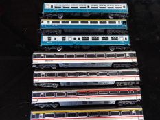 Model railways - seven OO gauge Hornby and Lima passenger carriages,