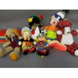 A good mixed lot of soft toys and vintage Teddy bears by poodles,