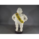 A large cast iron Michelin man,