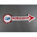 A cast iron arrow workshop sign, Volkswagen,