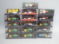 Minichamps - 16 boxed F1 racing cars by Minichamps in 1;64 and !;87 scale.