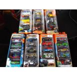 Matchbox on a Mission, Mattel seven sealed packs each containing five model motor vehicles,