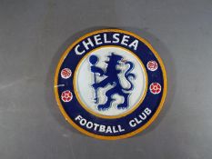 A circular cast iron Chelsea Football Club sign,