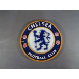 A circular cast iron Chelsea Football Club sign,