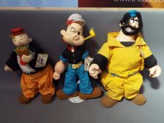 Popeye - Three vintage dolls / figures depicting characters from Popeye by 'Presents',
