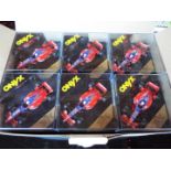 Onyx - 24 diecast model F1 racing cars with driver figures in square rigid transparent cases,