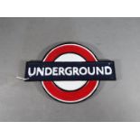 A cast iron Underground sign,