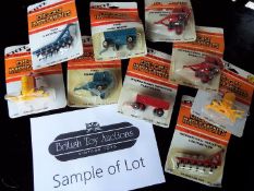 ERTL - approximately 24 diecast 1:64 scale model farm implements, wagons, bottom plows (ploughs),